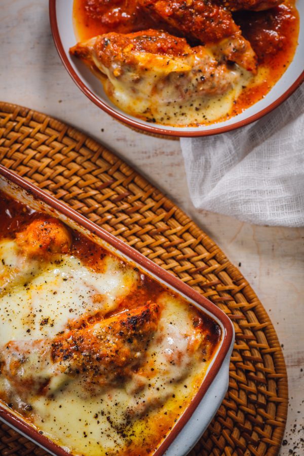 Chicken Parmigiana: crumbed and layered with mozzarella & Napoletana sauce (serves 2+)